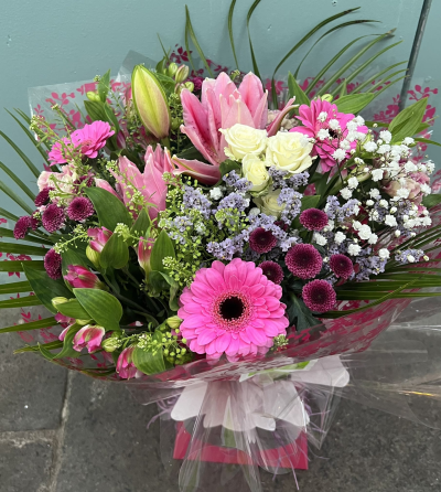 Mamma Mia - Make their day with this bright and vibrant collection of flowers, beautifully presented in a gift box / bag.