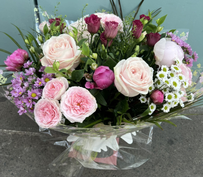 Out of this World - Looking for that ultimate gift that's out of this world!? Look no further. This fabulous hand-tied of the finest and freshest blooms is all you need to make a lasting impression...