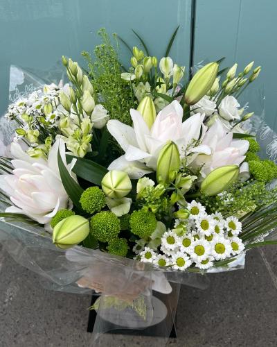 Forever Yours - Show your affection with this fabulous hand-tied  featuring white oriental lilies and foliage.