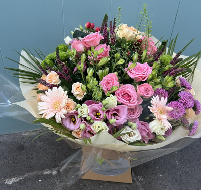 Pink Blossom - Fresh hand tied bouquet containing the freshest blooms of the season.