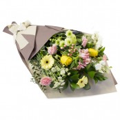 Eden Cut Flowers Gift Wrapped in Brown Paper