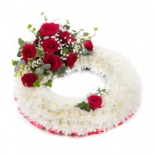 SYM-314 White Massed Wreath with Red Rose Spray